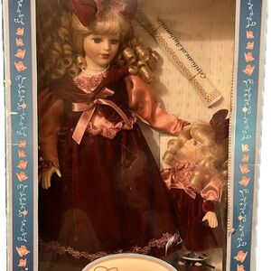 Collector’s choice porcelain Victorian, mother and daughter doll set